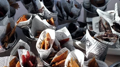 Snacks for beer. Dried salted fish, dried snack sticks, crackers. fish snacks Stock Footage 294640693