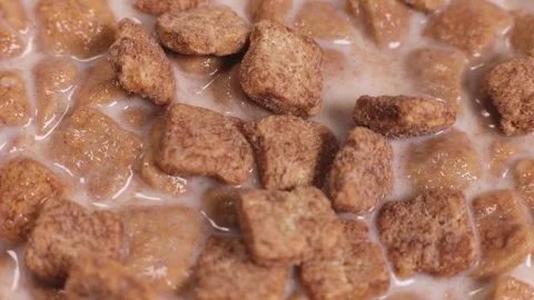 Snacks dry fast breakfast falling into milk Video stock 243722926