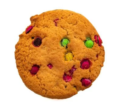 Snacks isolate close-up. Cookies interspersed with colored balls Stock Photos