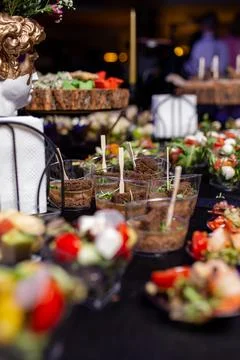 Snacks in a plastic cup on the buffet catering Stock Photos