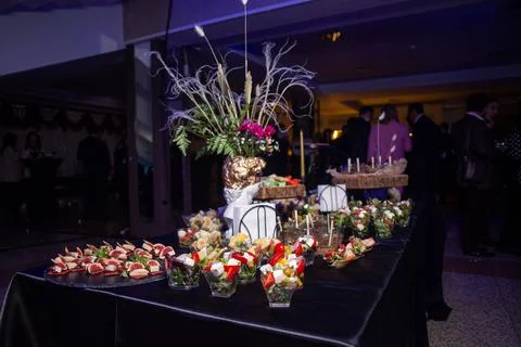 Snacks in plastic cups on the buffet at the event Stock Photos