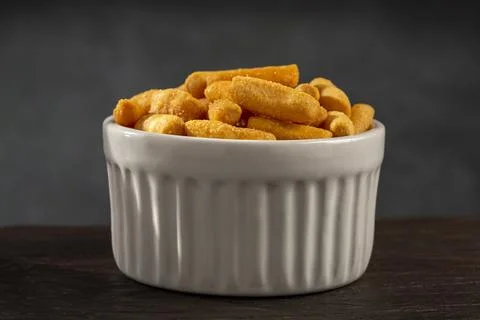 Snacks in ramekin on the table. Stock Photos
