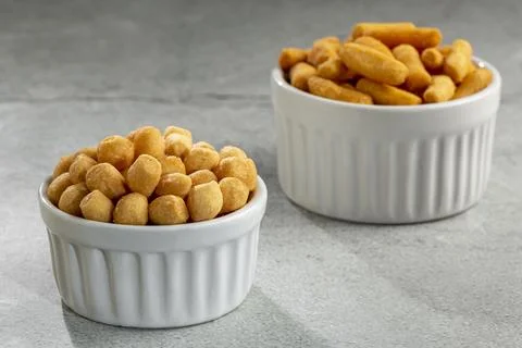 Snacks in ramekin on the table. Stock Photos