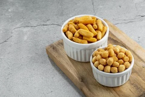 Snacks in ramekin on the table. Stock Photos