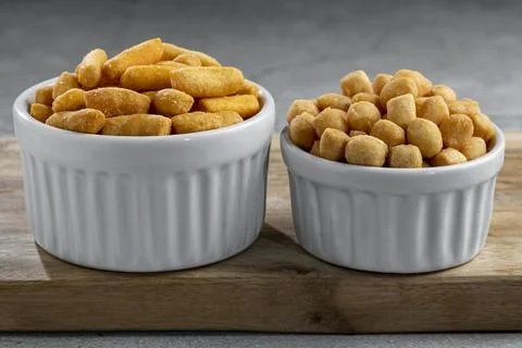 Snacks in ramekin on the table. Stock Photos