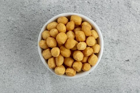Snacks in ramekin on the table. Stock Photos