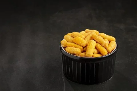 Snacks in ramekin on the table. Stock Photos