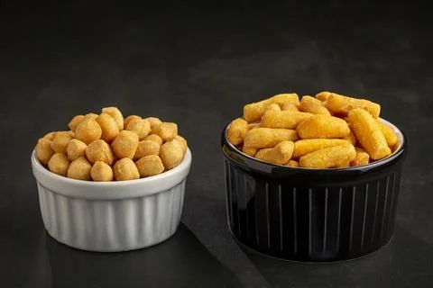 Snacks in ramekin on the table. Stock Photos