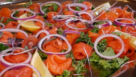 Snacks with redfish. slices of cooked red fish close-up 스톡 동영상 164042065