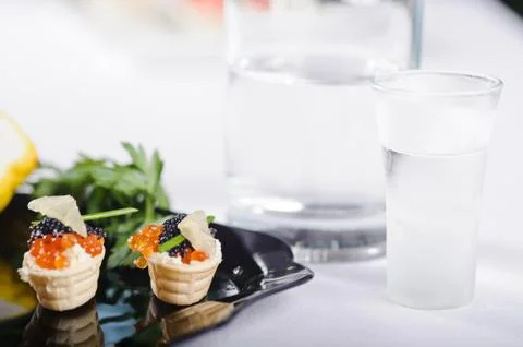 Snacks with salmon roe Stock Photos