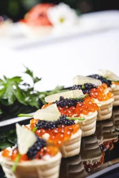 Snacks with salmon roe Stock Photos