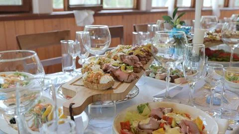 Snacks on the table, catering concept. Buffet indoors. Banquet white table with Stock Photos