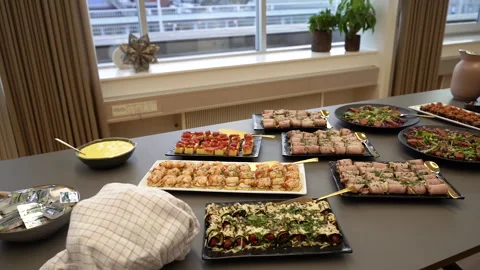 Snacks. There are trays with different foods on the table. Stock Footage 306182938