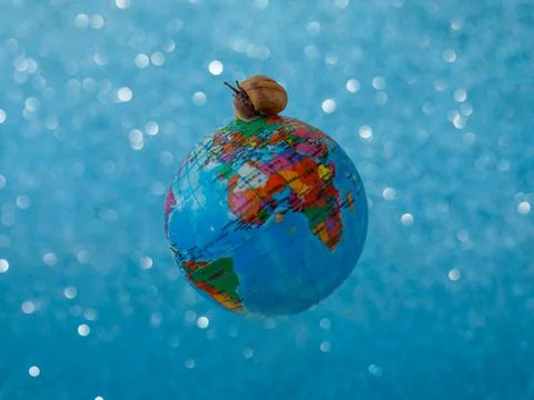Snail come out of its shell and going to travel around world after pandemic Stock Photos