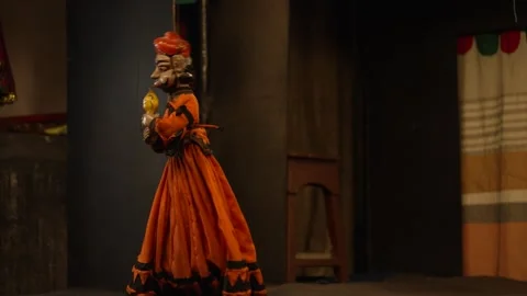 Snake Charmer Puppet Performing with Snake Stock Footage 310560076