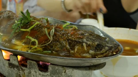 Snake head fish fried to Thai food salad. Stock-Footage 73062382