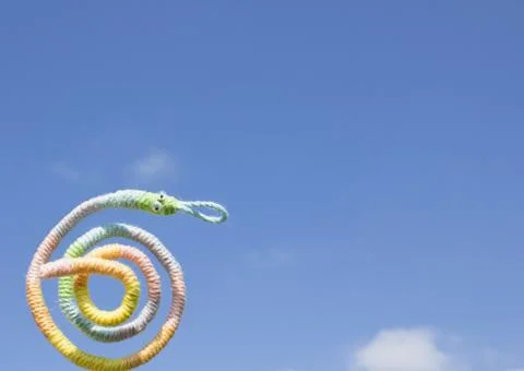 Snake made from a code and blue sky 스톡 사진