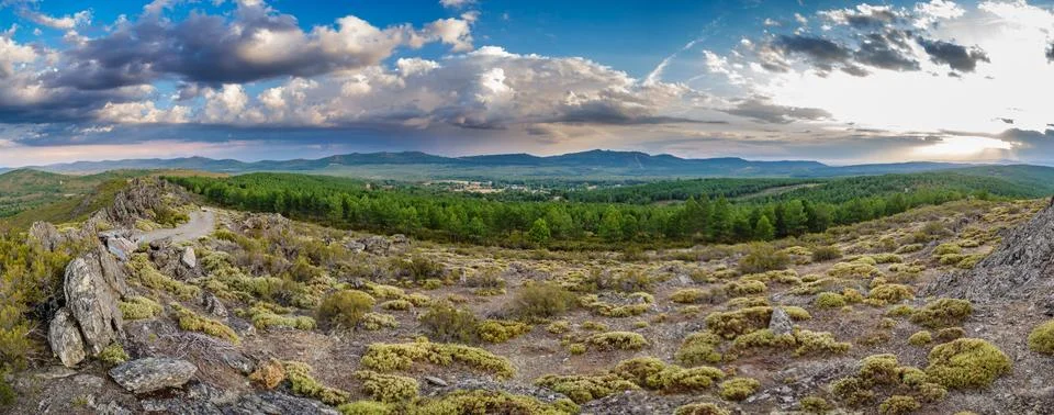 Snake mountain and cloudy sky at dusk in Spain Foto stock