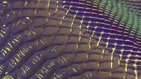 Snakeskin Iridescent texture close up. Glittery holographic background Stock Footage 131910587