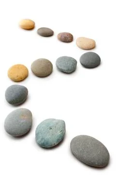 Snaking line of twelve pebbles steps isolated vertical Stock Photos