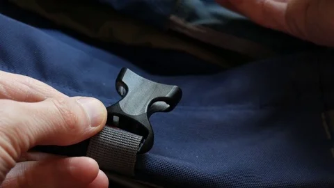 Snap the buckle lock on the backpack Stock Footage 73377446