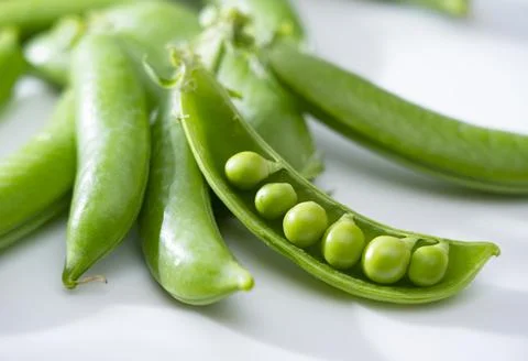 Snap peas on a white background Stock Photos