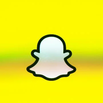 Snapchat ghost logo on Apple iPhone screen 스톡 사진