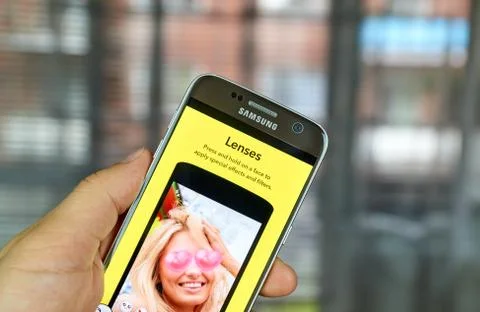 Snapchat lenses on cell phone Stock Photos