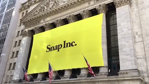 Snapchat's Snap Inc. makes IPO debut on the New York Stock Exchange.  Stock Footage 73058777