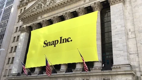 Snapchat's Snap Inc. makes IPO debut on the New York Stock Exchange.  Stock Footage 73058785