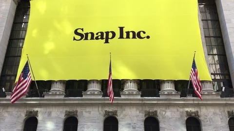 Snapchat's Snap Inc. makes IPO debut on the New York Stock Exchange.  Stock Footage 73058786
