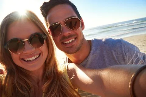 Snapping the perfect profile picture. an affectionate young couple taking a Stock Photos