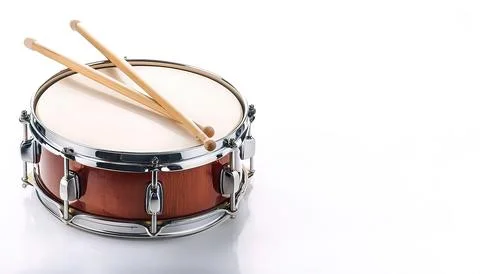 Snare or side drum is a percussion instrument that produces a sharp staccat.. Stock Photos
