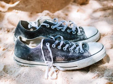 Sneaker on the beach Stock Photos