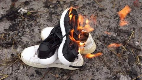 Sneakers burn a lot of fire Stock Footage 256742464