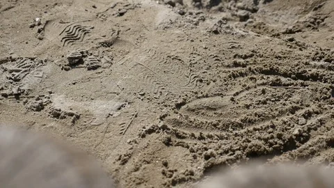 Sneakers footprints in sand Stock Footage 88597972