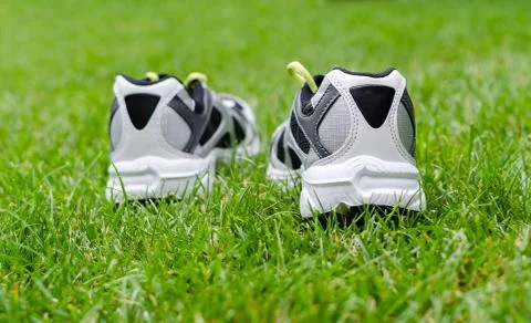 Sneakers on grass Stock Photos