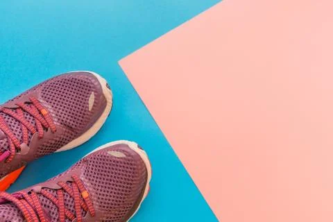 Sneakers on a multi-colored background, concept infusion on sports. Stock-Fotos