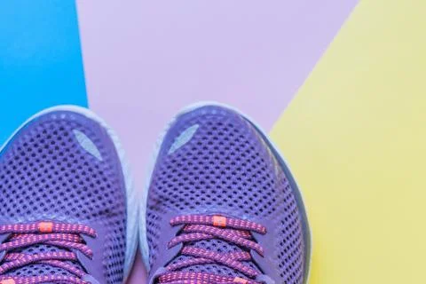 Sneakers on a multi-colored background, concept infusion on sports. Foto stock
