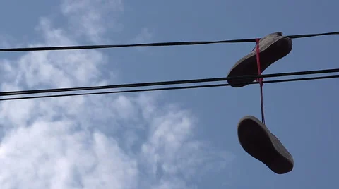 Sneakers on power lines 動画素材 54077242