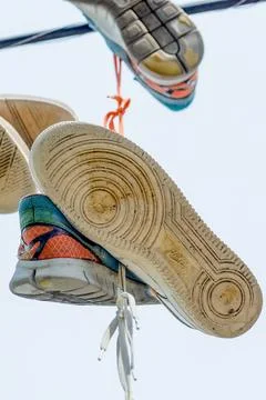 Sneakers on a Wire Stock Photos