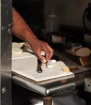 Sneaky Hand In Kitchen Stock Photos