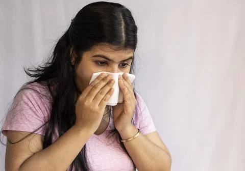 Sneezing on white background Stock Photos