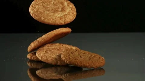 Snickerdoodle cookies stack on dark mirror surface Stock Footage 326752346