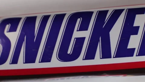 Snickers chocolate bar closeup Video stock 228287441