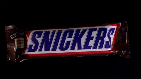  Snickers chocolate bar rotates  Video stock 228287280