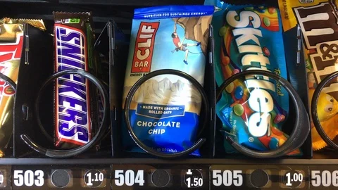 Snickers chocolate candy bar falling fro... | Stock Video | Pond5