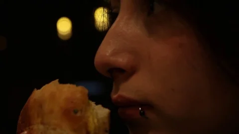Sniffing and eating sandwich Stock Footage 78954797