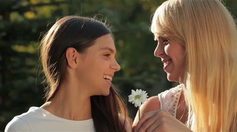 Sniffing camomile Stock Footage 55212958