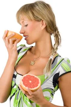 Sniffing grapefruit Stock Photos